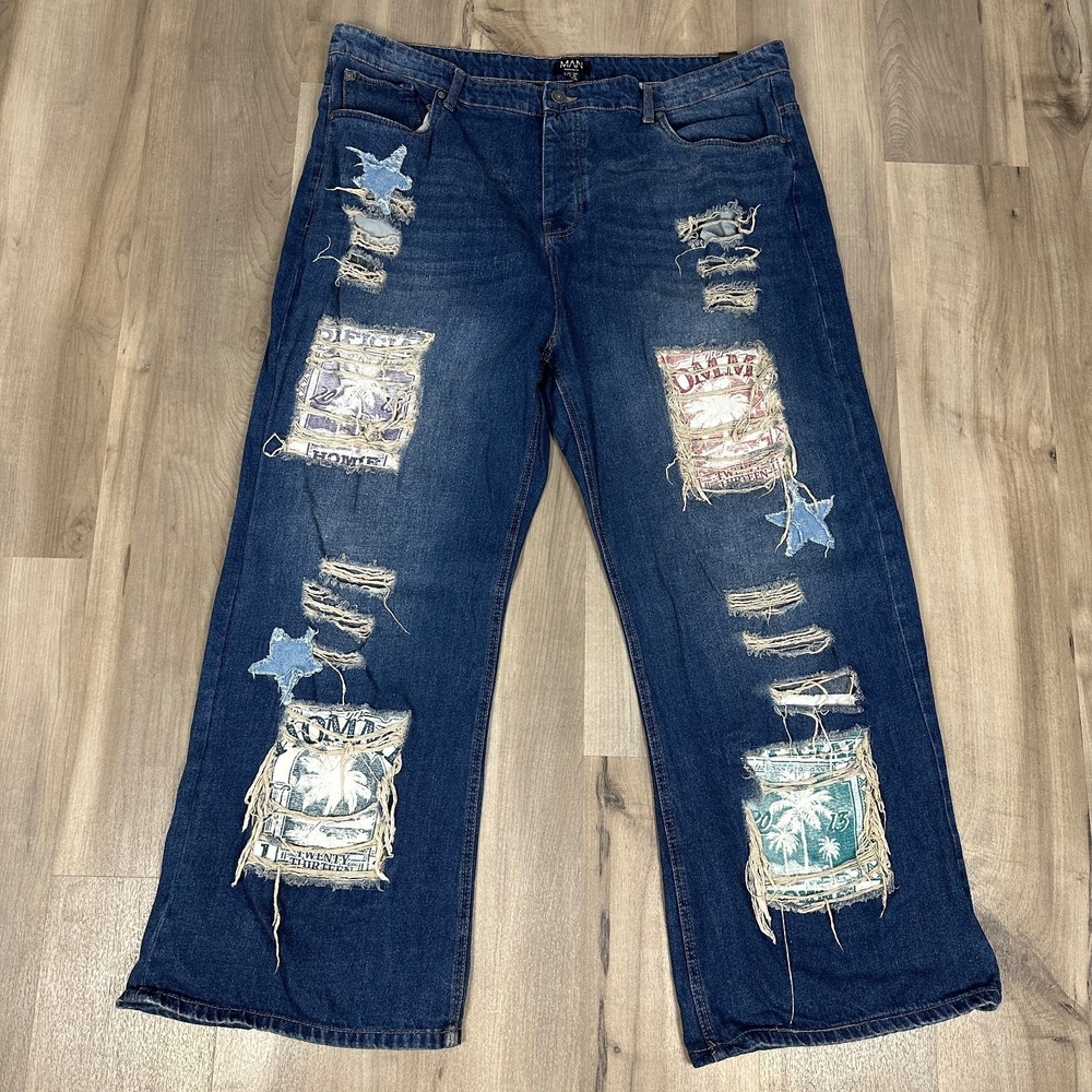 boohooMAN Distressed Baggy Jeans Mens 44 Ripped Patchwork Graphic Wide Leg Denim